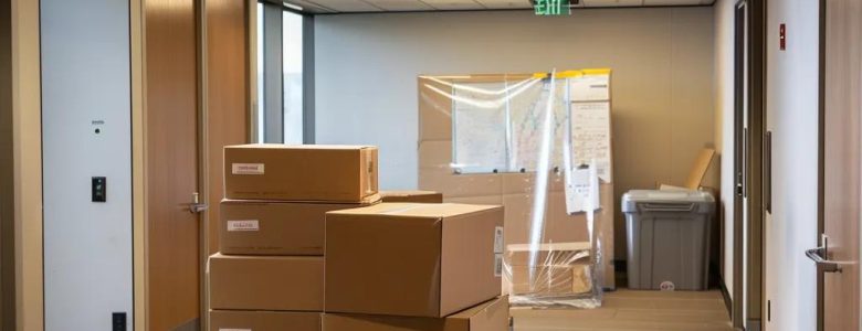 a sleek, modern office environment showcases professional long distance movers efficiently coordinating logistics with a digital map and portable moving equipment, emphasizing the seamless relocation services for gaithersburg md residents.